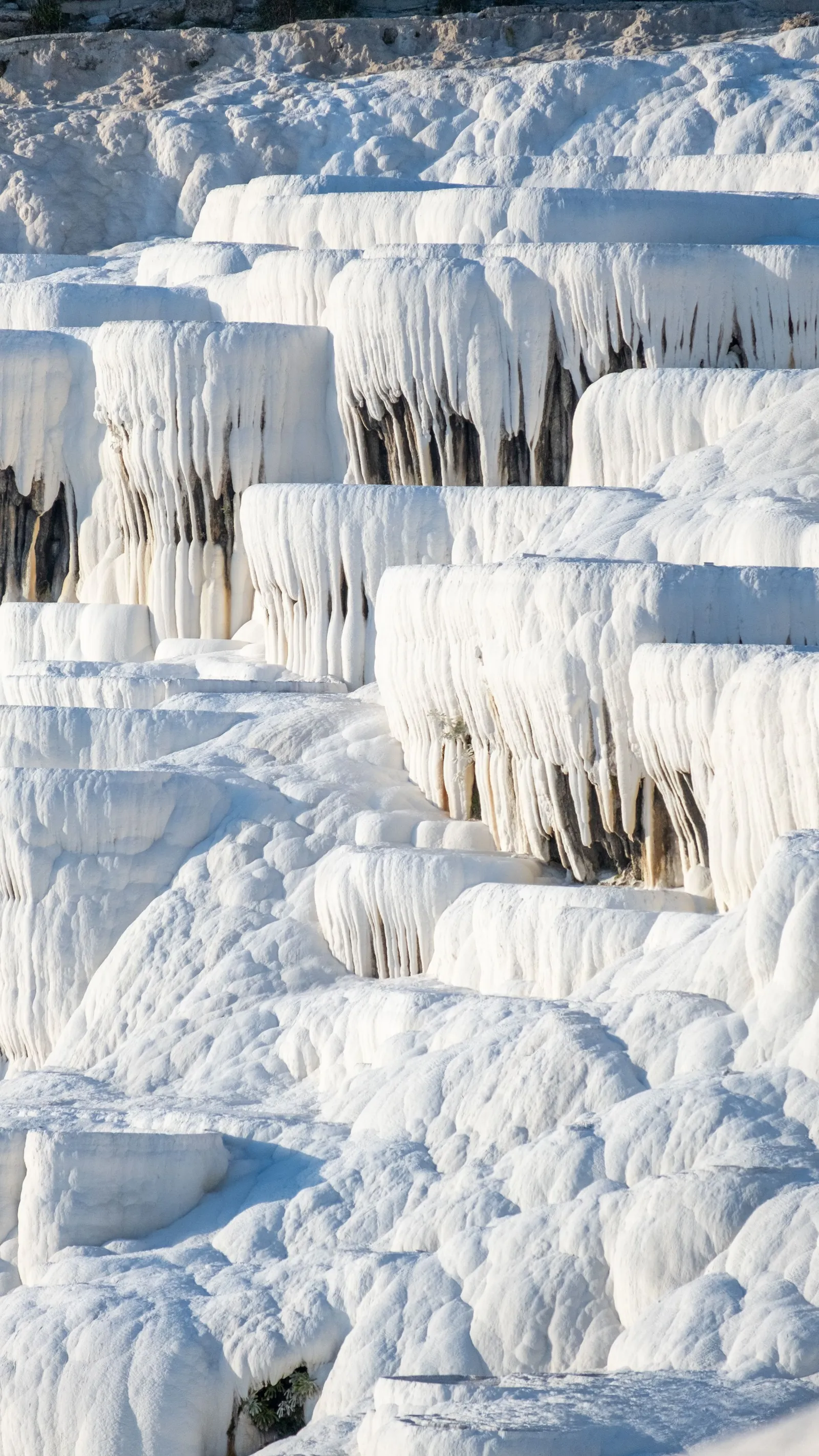White travertine terraces of Pamukkale near Denizli, Turkey